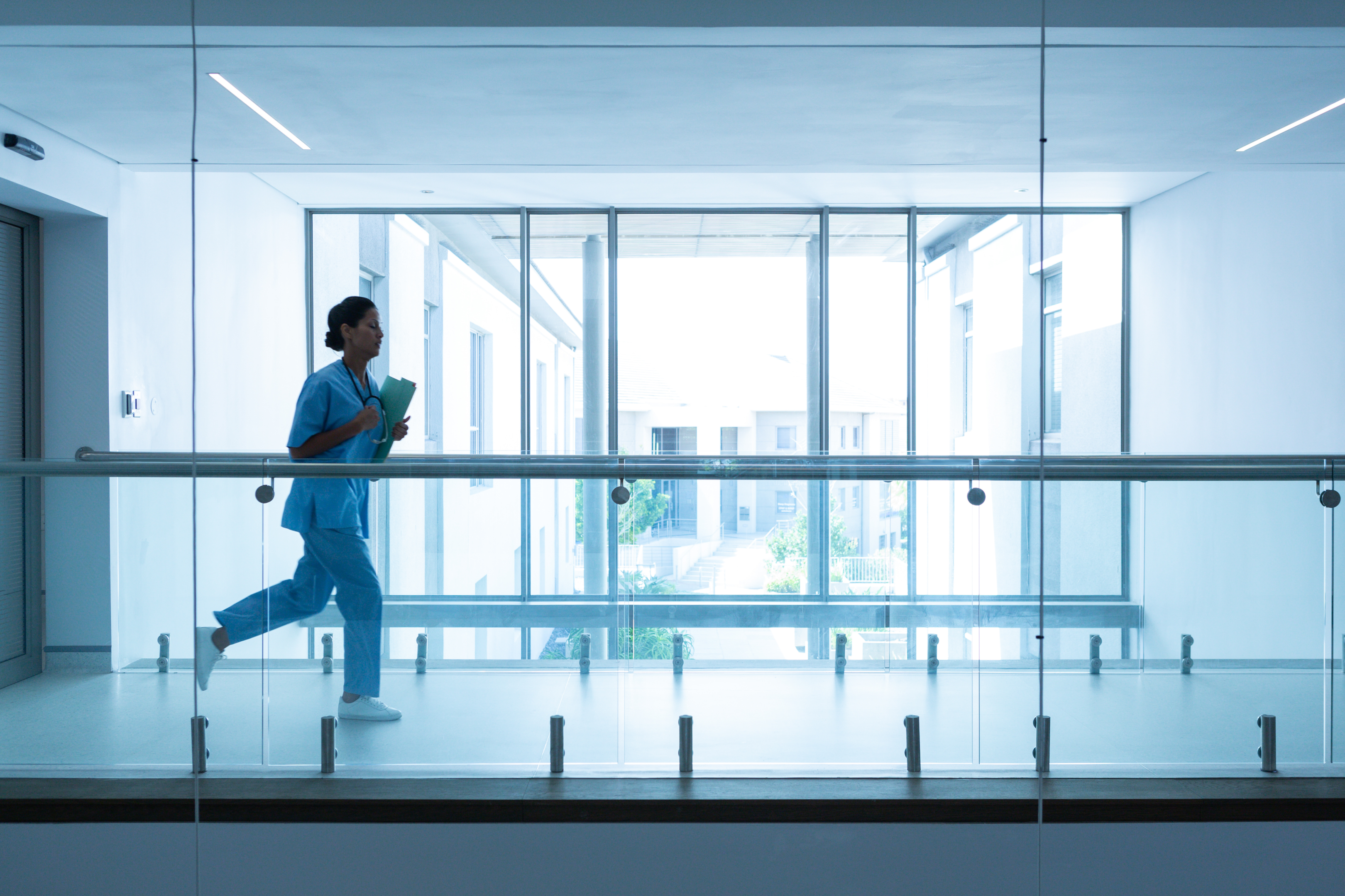 Photo of a hospital worker attending to a motor vehicle accident