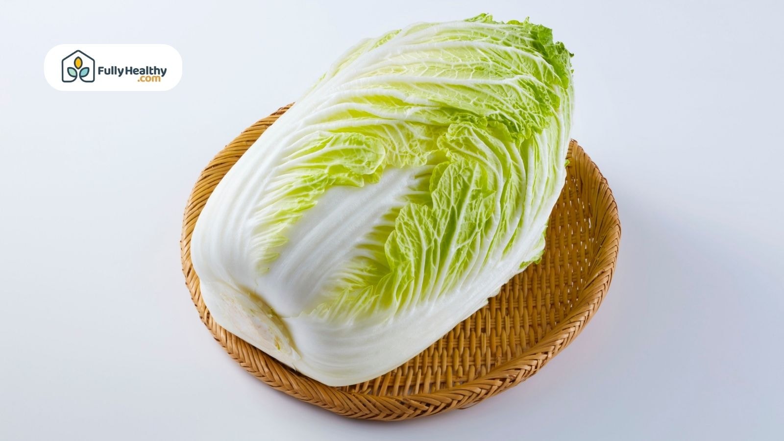 Fresh Napa cabbage displayed on woven bamboo basket