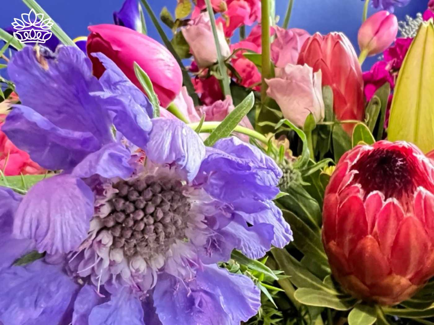 Close-up of vibrant blooms from the Flowers By Type Collection at Fabulous Flowers and Gifts. Small flowers grow beautifully with water, creating a stunning arrangement.