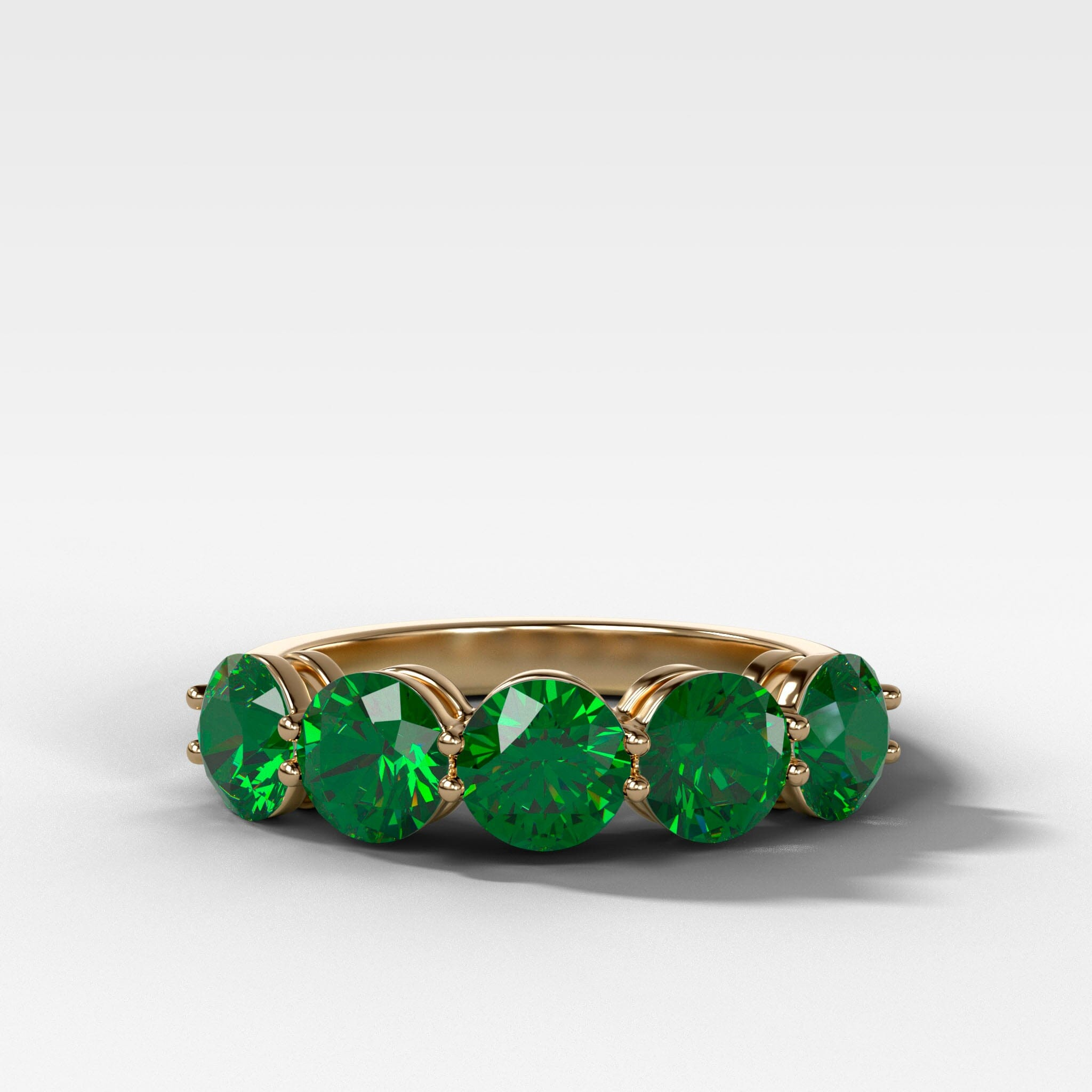 GOODSTONE Five Stone Shared Prong Band with Round Green Emeralds