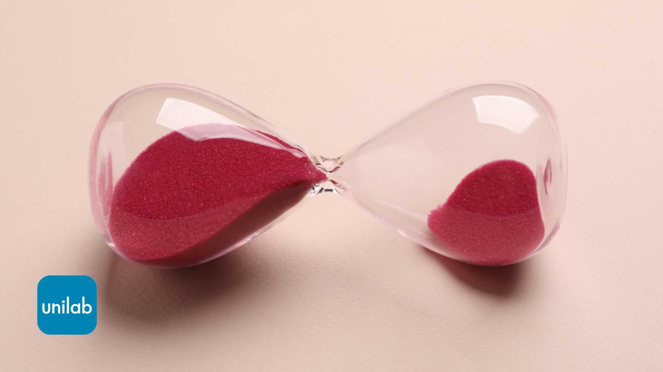 A pink sand hour-glass