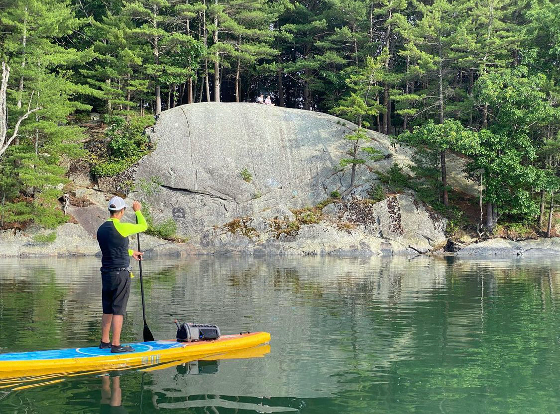 inflatable paddle board on a lake