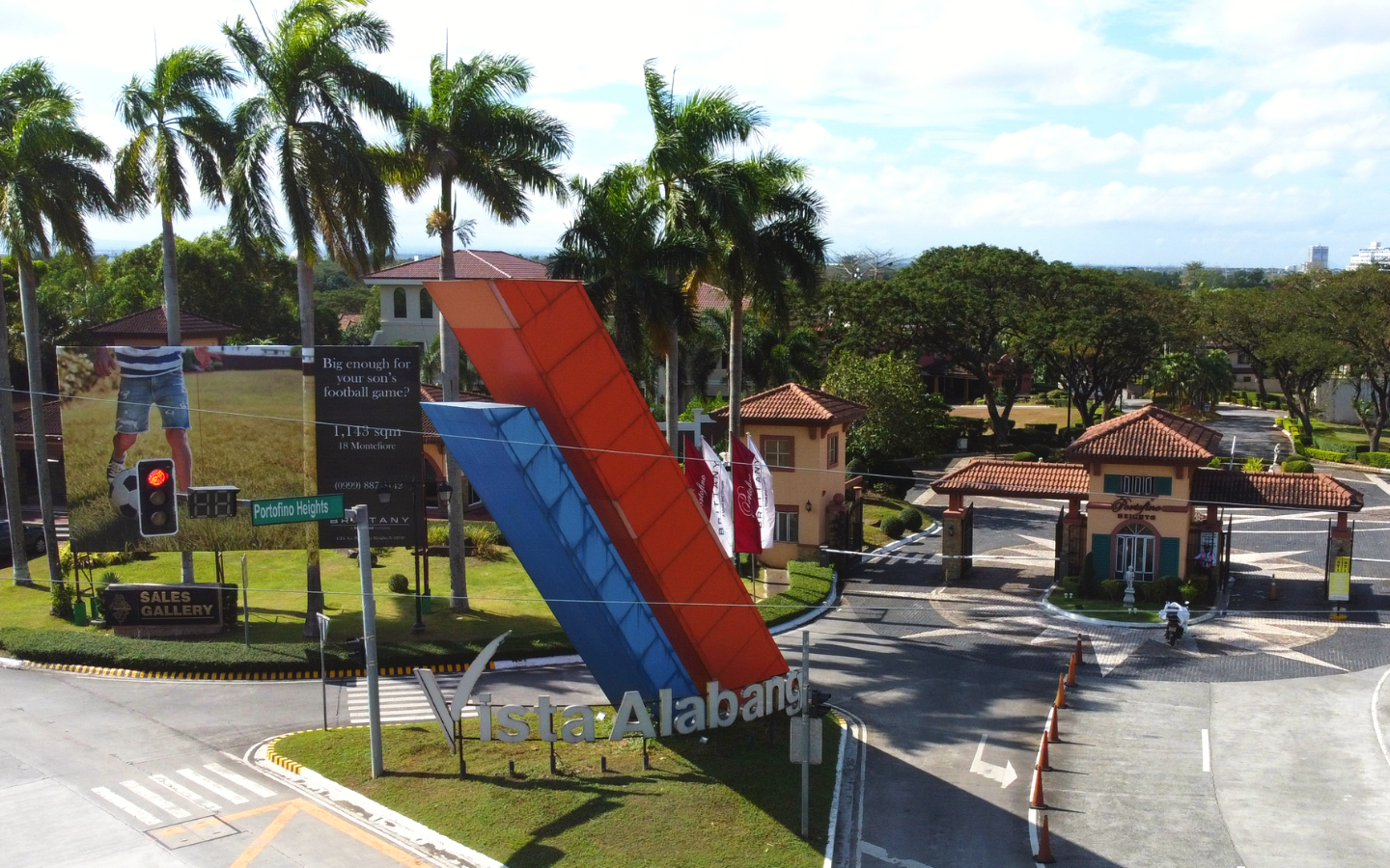 Image of Vista Alabang logo in front of the Portofino Heights entrance