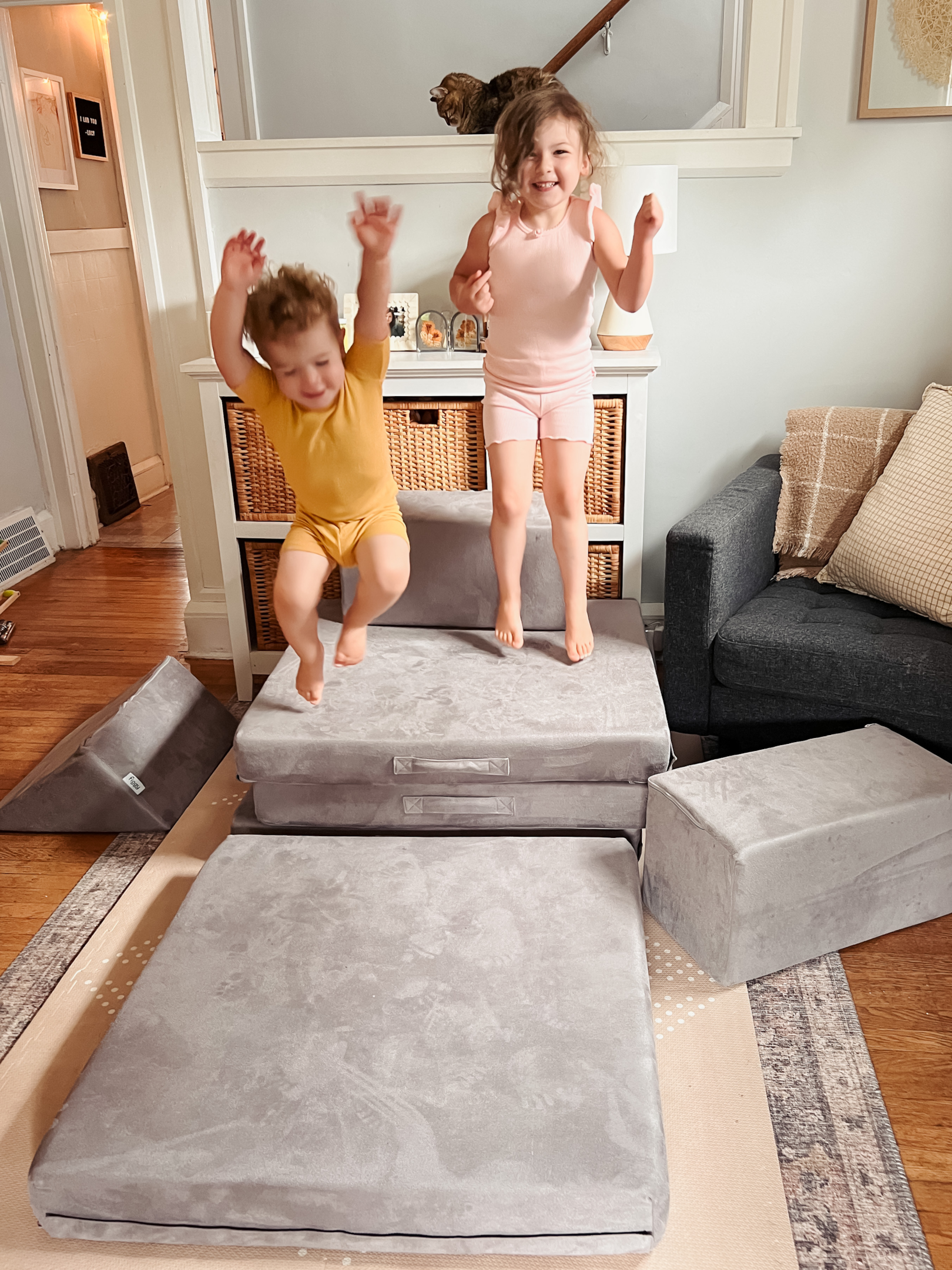 Kids jumping on a Figgy play couch