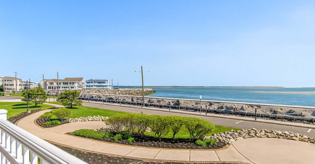 Scenic view overlooking Moore’s Inlet in North Wildwood, featuring landscaped walking paths, waterfront views, and nearby homes along the shoreline.