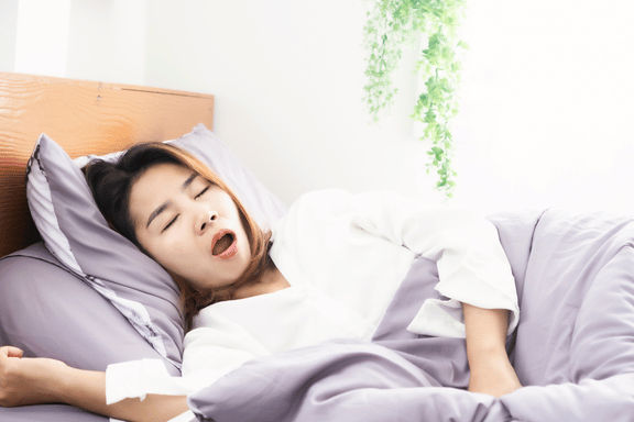 female sleeping who suffers from severe sleep apnea