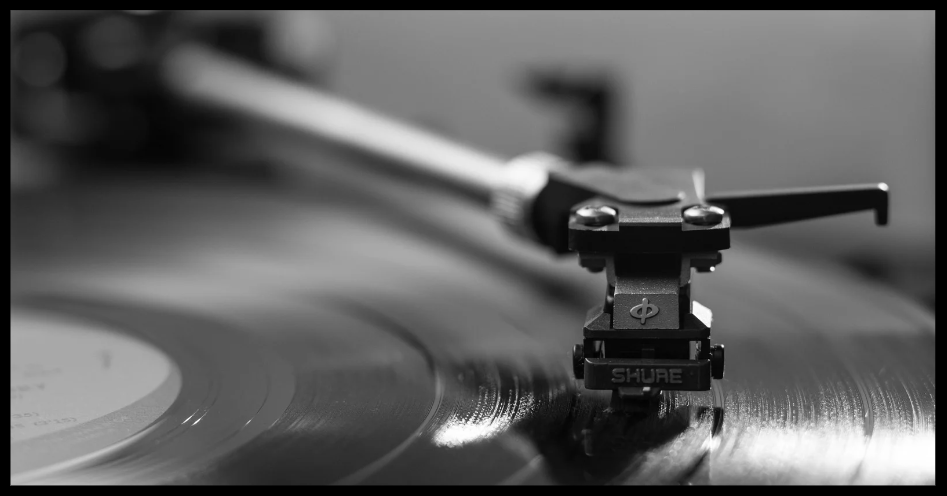 Close-up image of a record on a turntable, representing the question, "Why is my record skipping?"