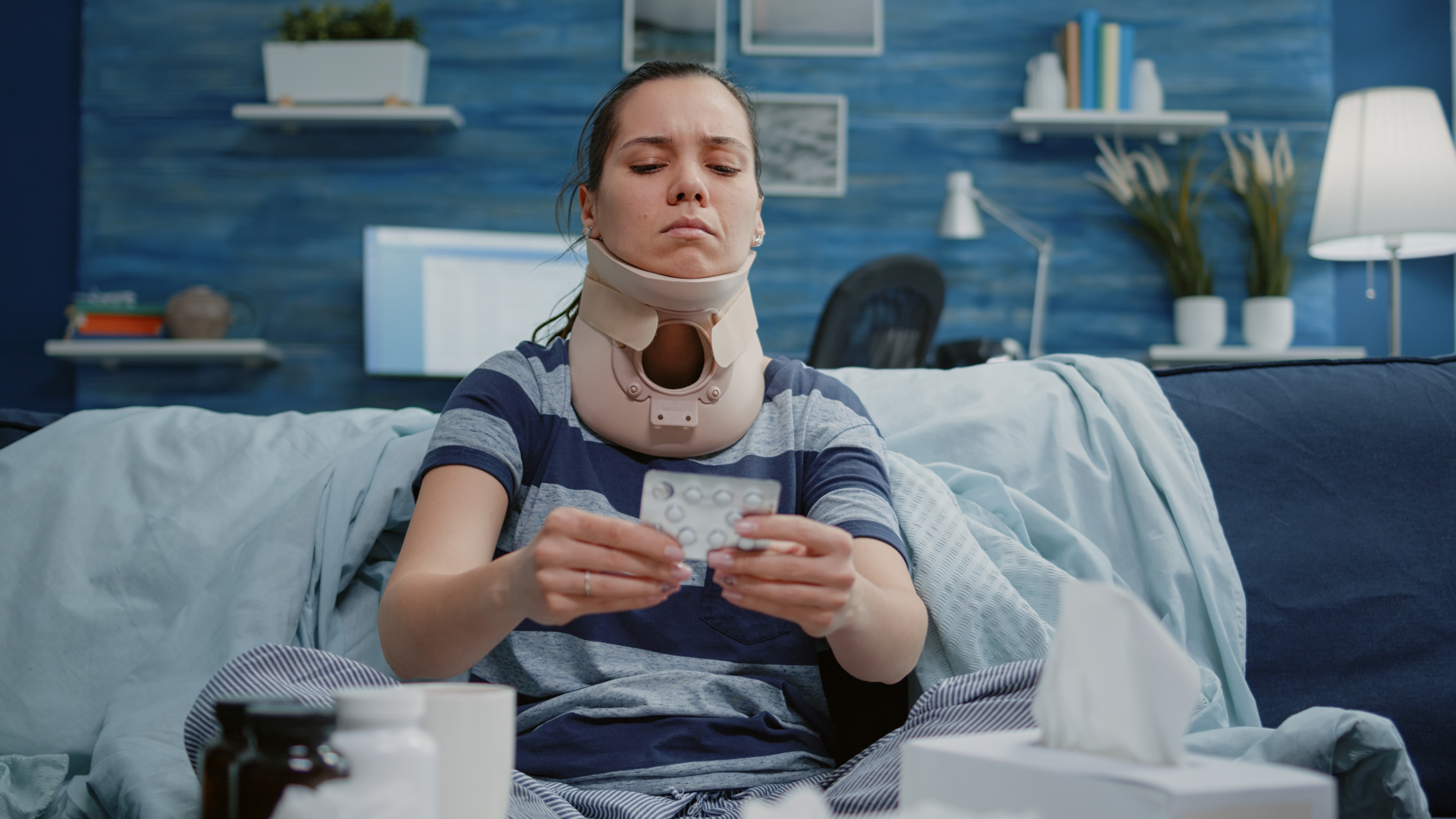 A woman wearing cervical collar after injury. Designed by Freepik