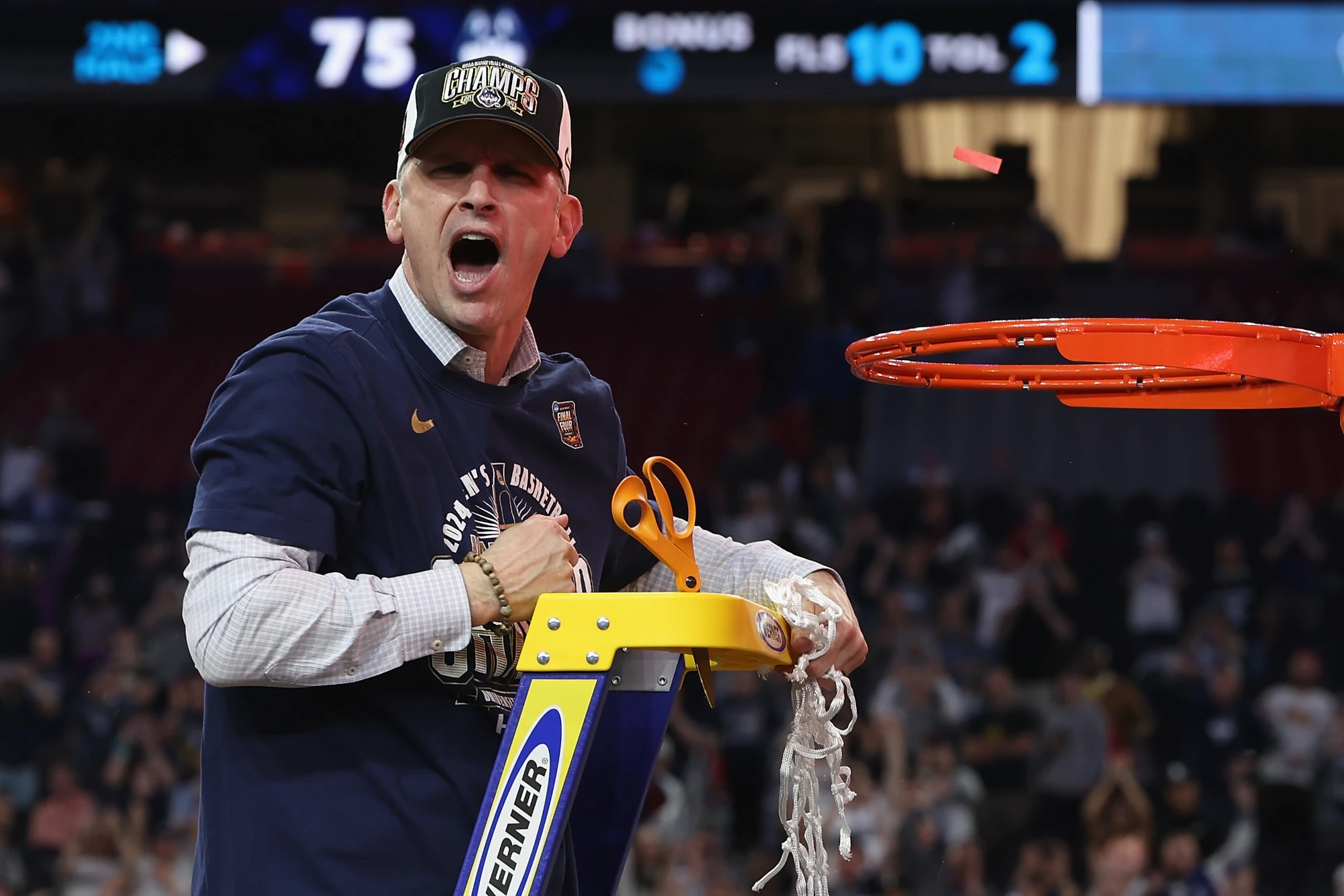 Head coach Dan Hurley of the Connecticut Huskies cuts down the net after beating the Purdue Boilermakers 75-60 to win the NCAA Men's Basketball Tournament National Championship game at State Farm Stadium on April 08, 2024 in Glendale, Arizona.