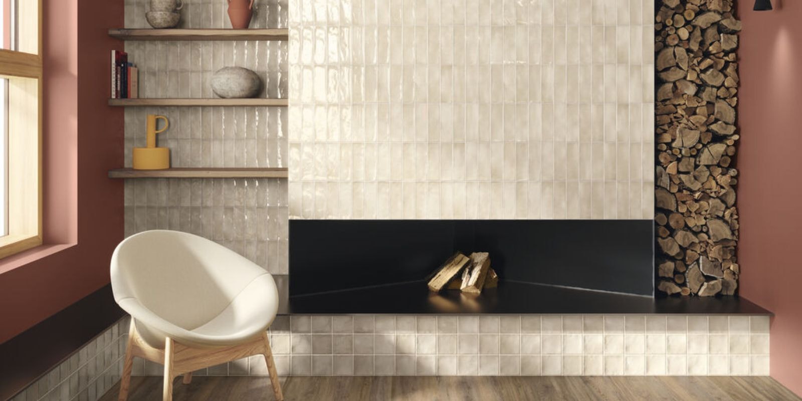 Modern cozy living space with tiled fireplace, stacked firewood, and cream lounge chair.