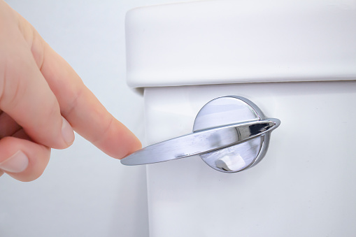 how to make a toilet flush quietly