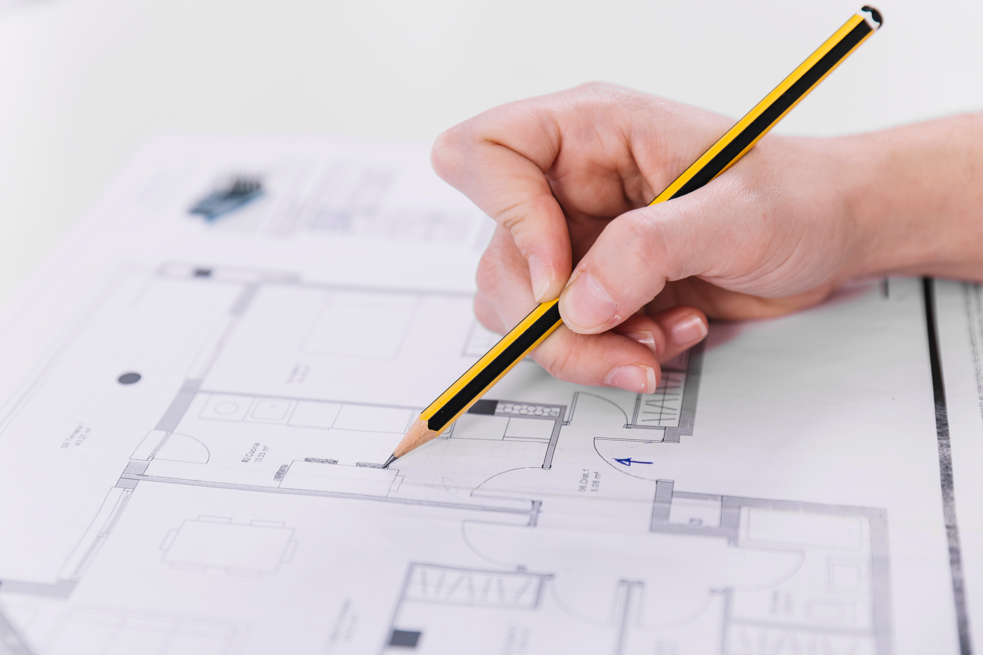 A close-up image of an architect designing structural elements for a specific project. 