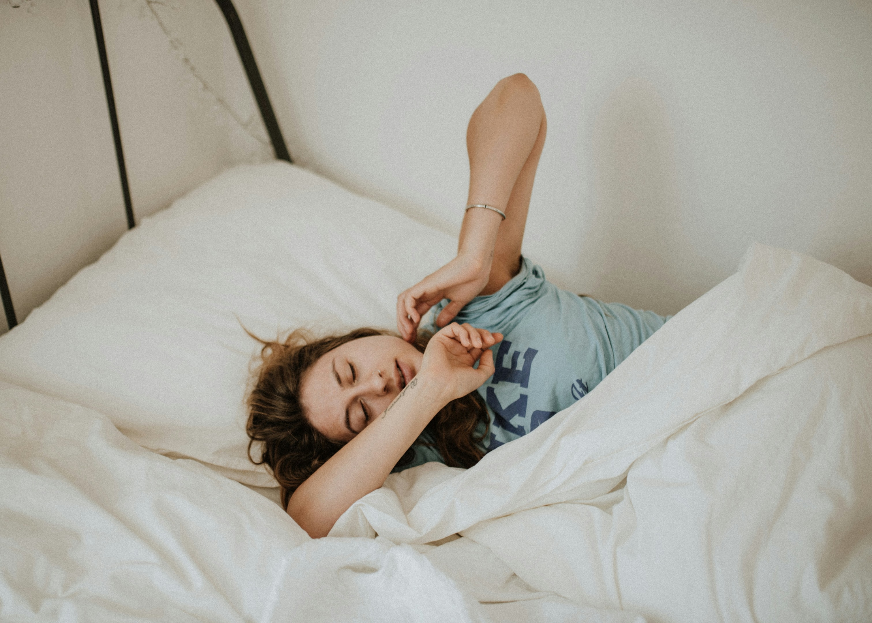 A dental professional demonstrating a mouthpiece for snoring.