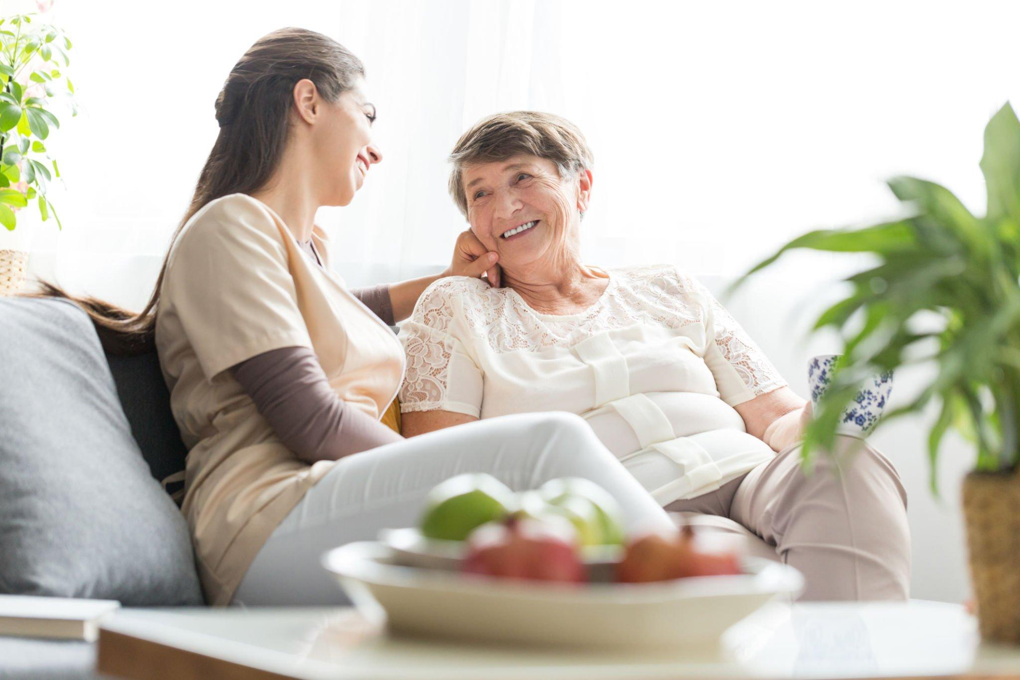 Two individuals engaged in a happy conversation