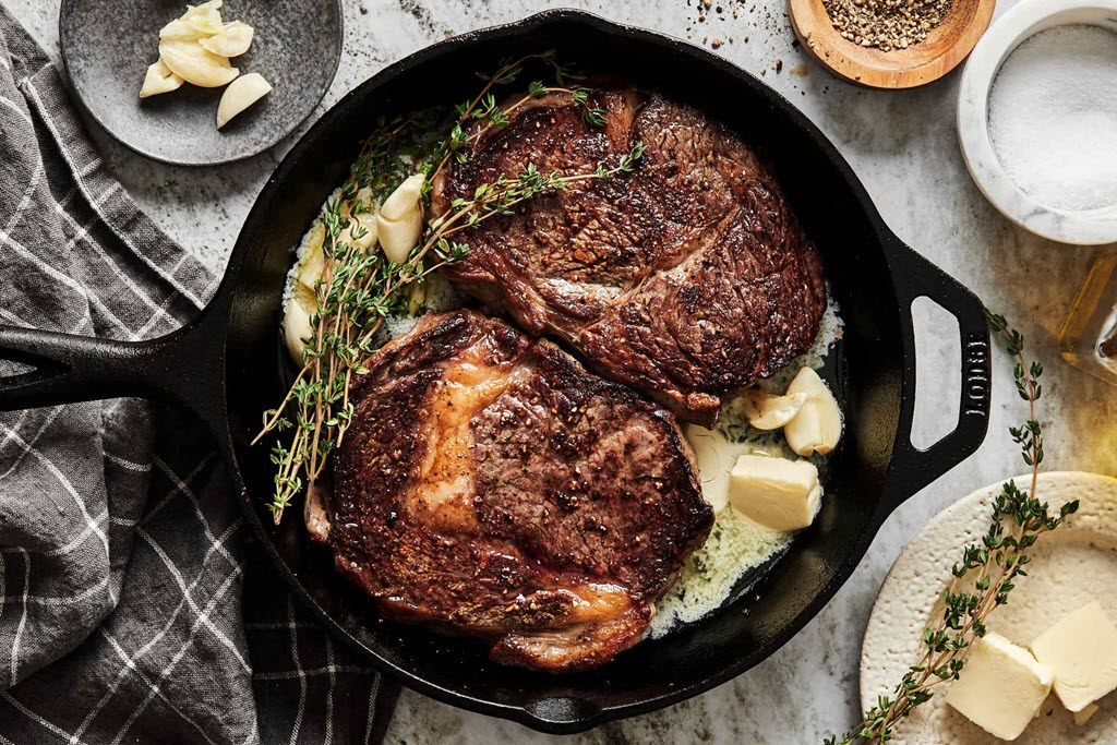 Pan searing steak with butter, garlic and thyme