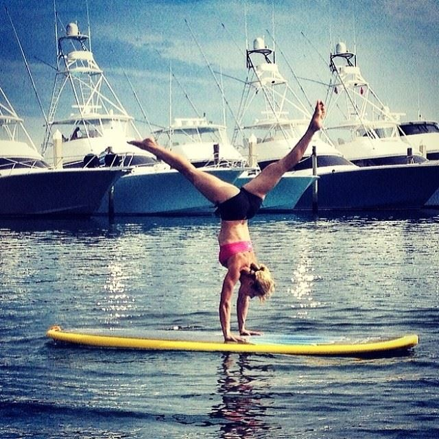 sup yoga on a paddle board