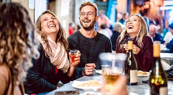 Friends enjoying a wine tasting in San Diego.