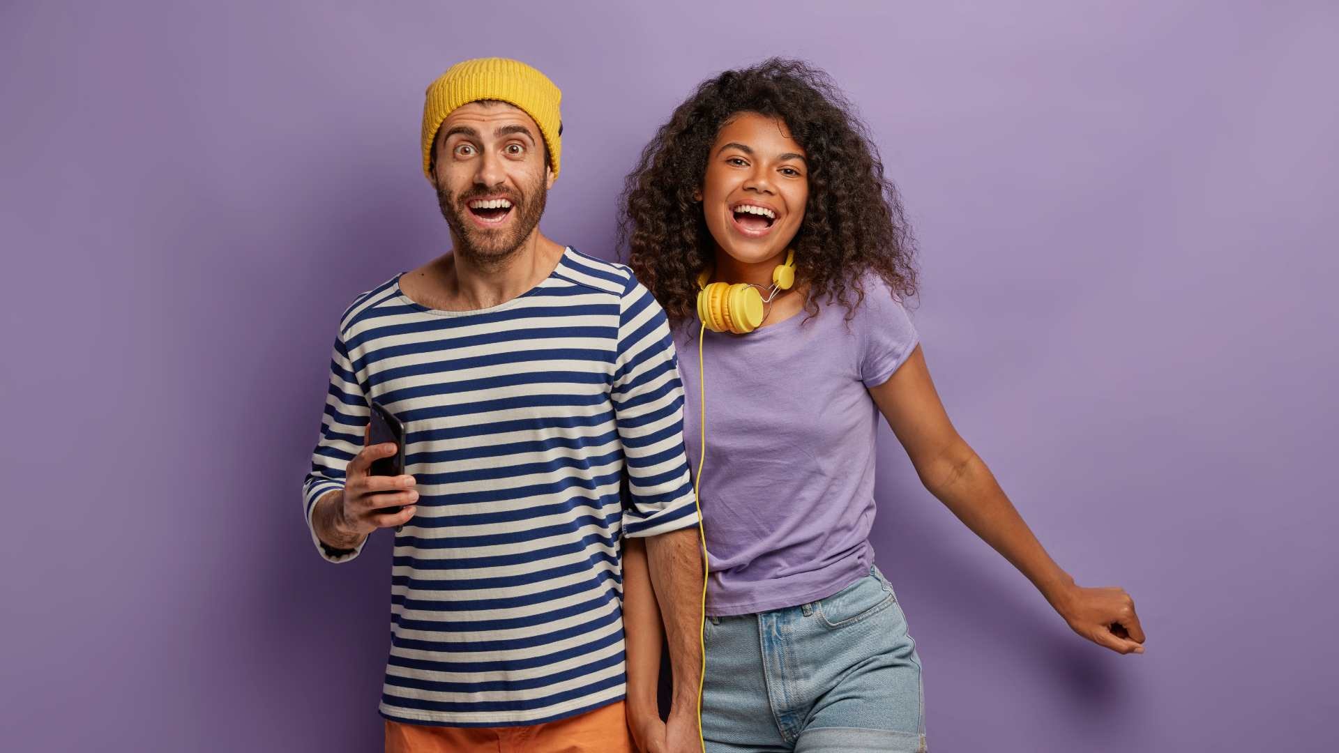 Top 10 Probiotics in South Africa - The Good Stuff with a joyful pair dressed casually in purple and striped outfits, set against a purple background.