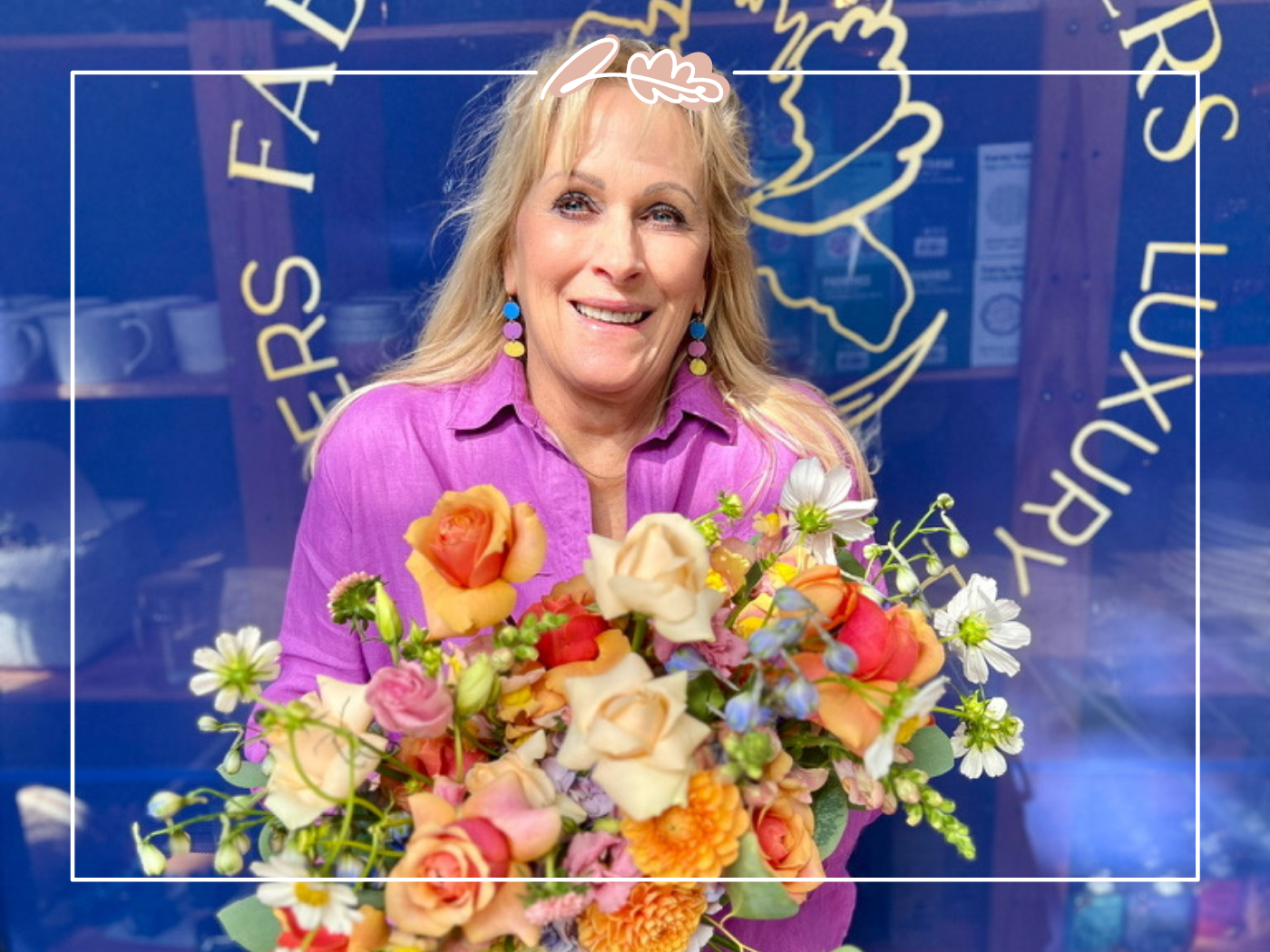 Josie van Aswegen of Fabulous Flowers in store, holding a stunning bouquet of fresh flowers, symbolising the beauty and joy of floristry. .