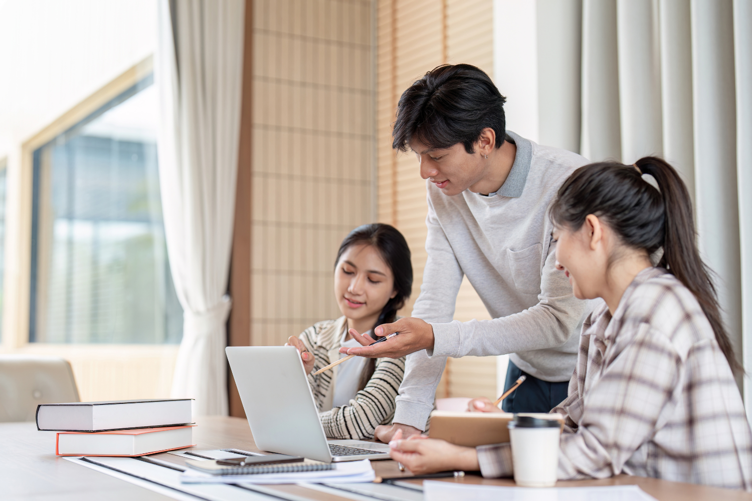 Coworkers collaborating on a project with shared responsibilities.