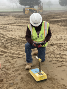Soil compaction test equipment in a construction site