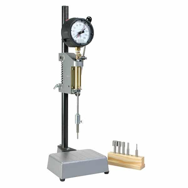 An image of a penetrometer, a device used to measure the penetration resistance of materials.