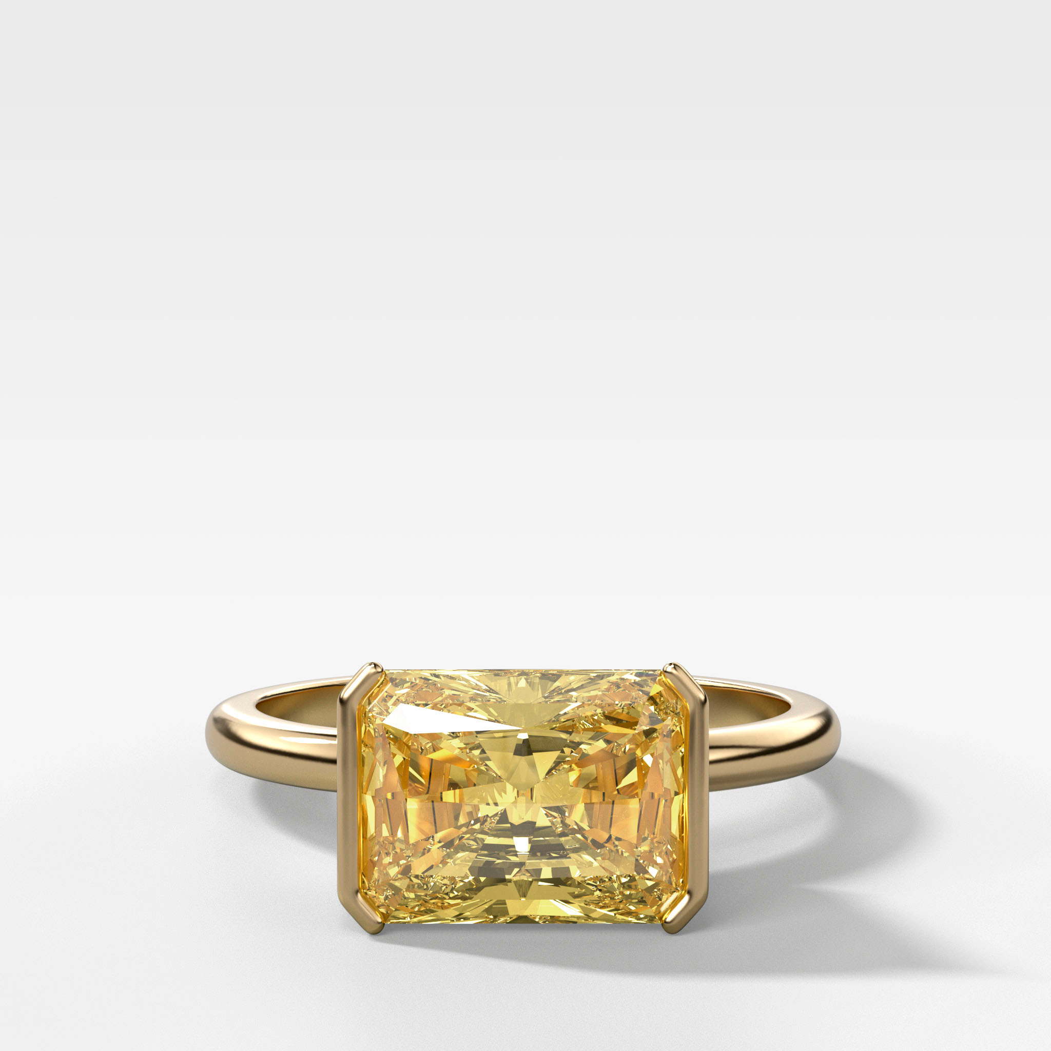 GOODSTONE East West Half Bezel Solitaire Engagement Ring With Canary Yellow Elongated Radiant Cut Diamond
