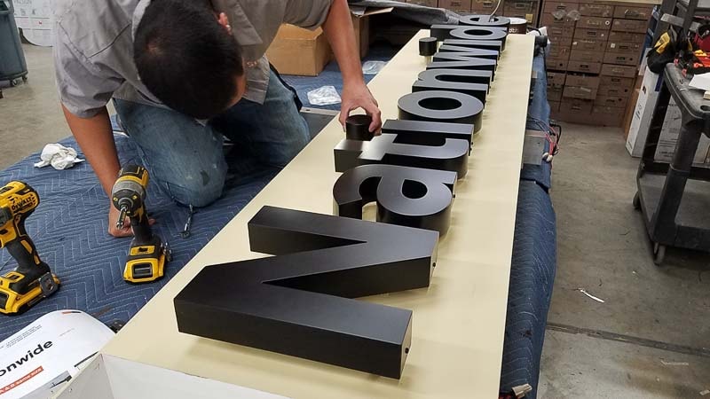 Nationwide channel letter sign fabrication in shop at Dave's Signs.