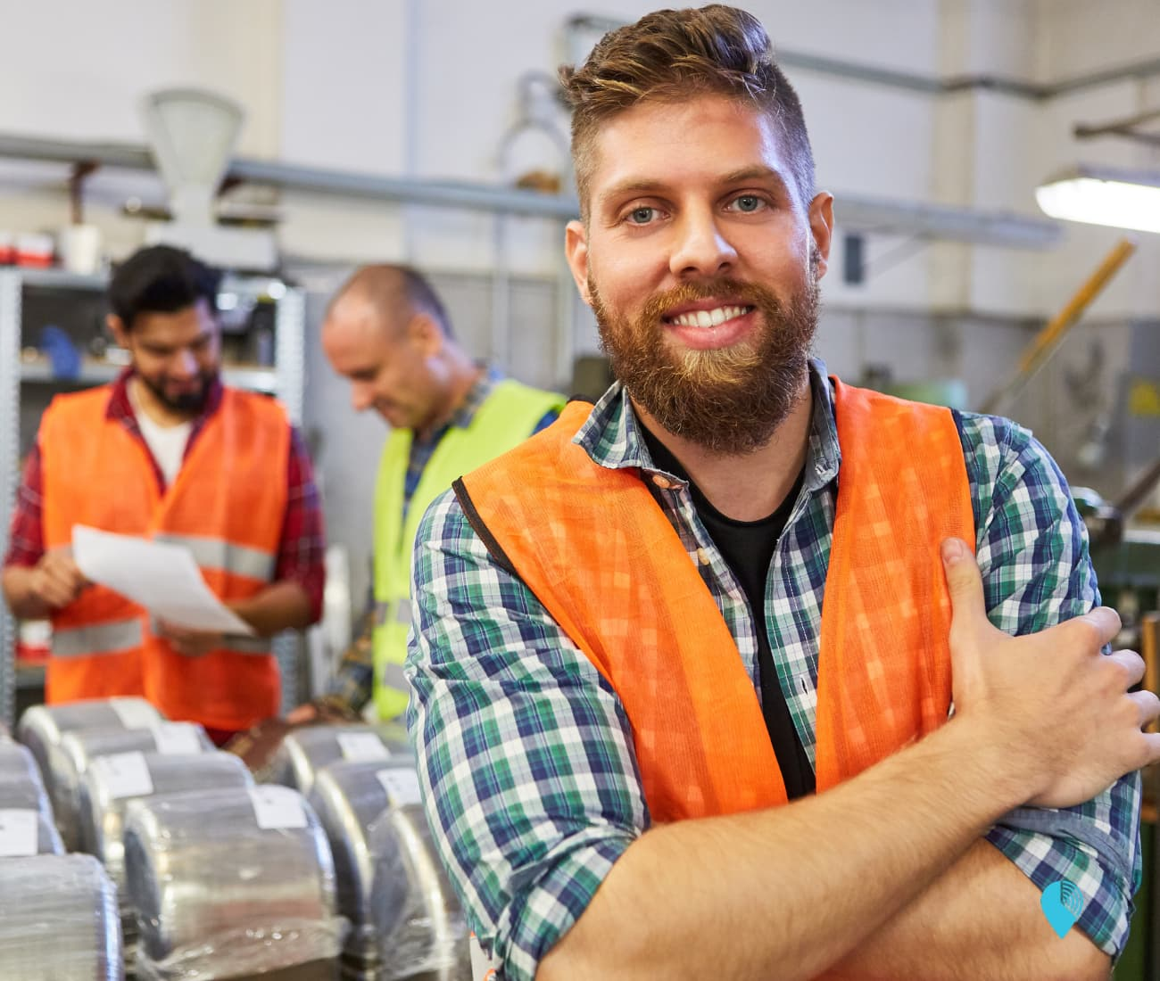 a happy warehouse employee demonstrating positive employee engagement
