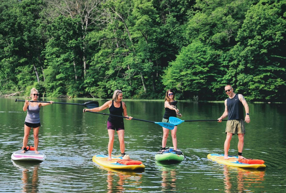 the entire family enjoys sup yoga on the right board