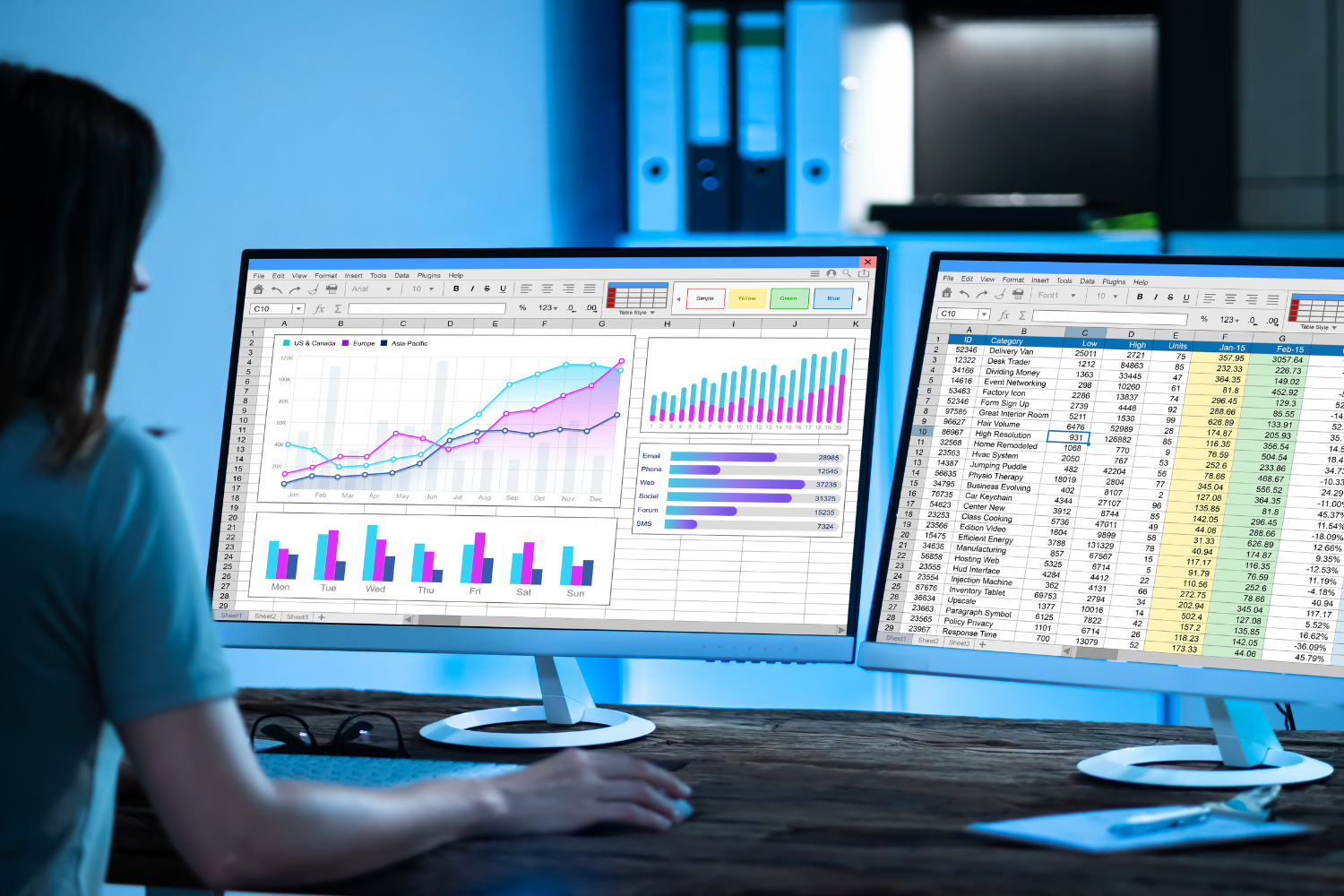 Woman checking digital spreadsheet.