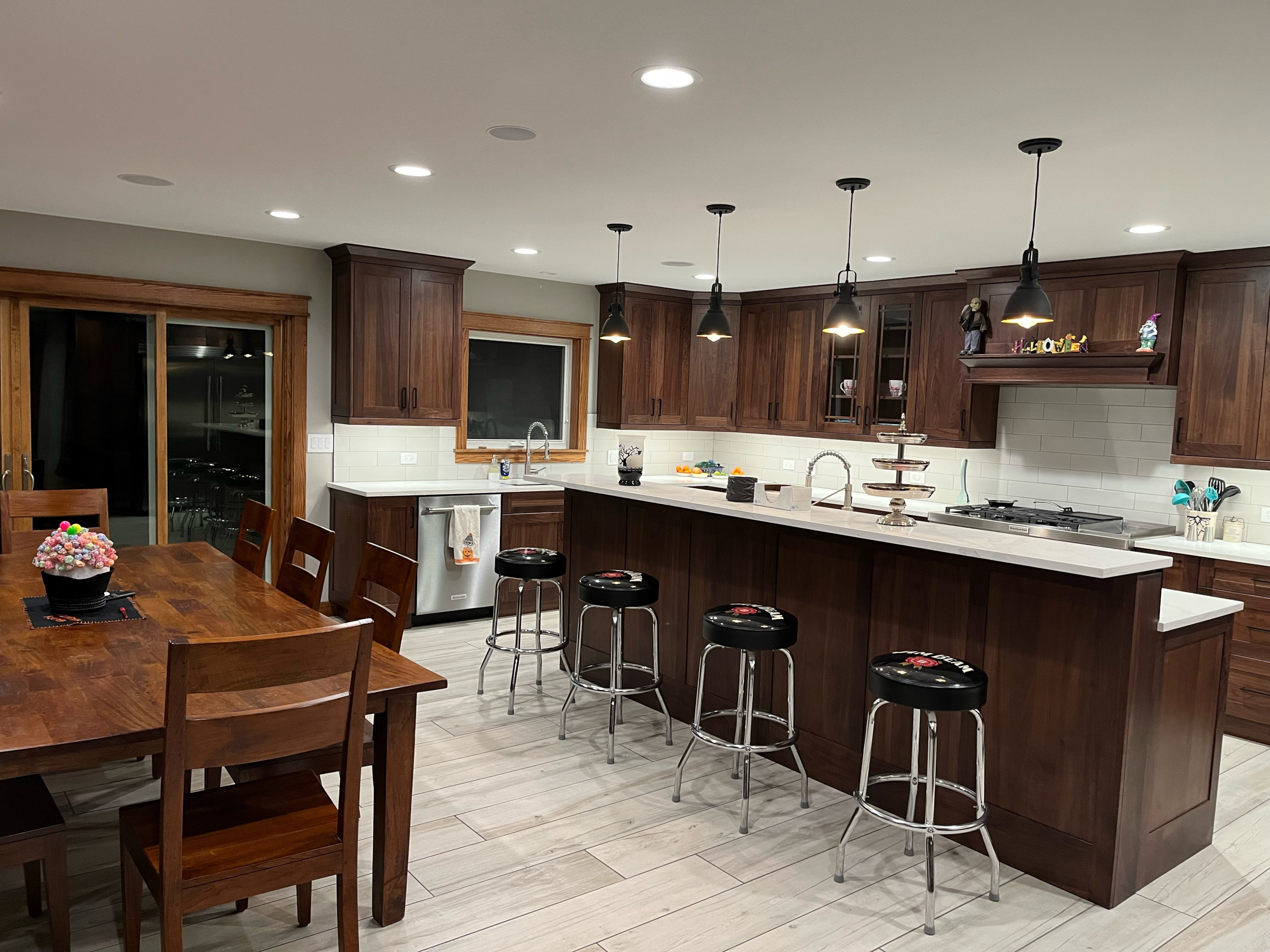 brown kitchen cabinets with white countertops