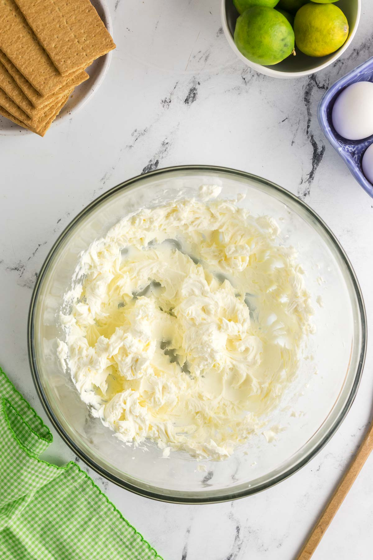 cream cheese beaten in glass bowl