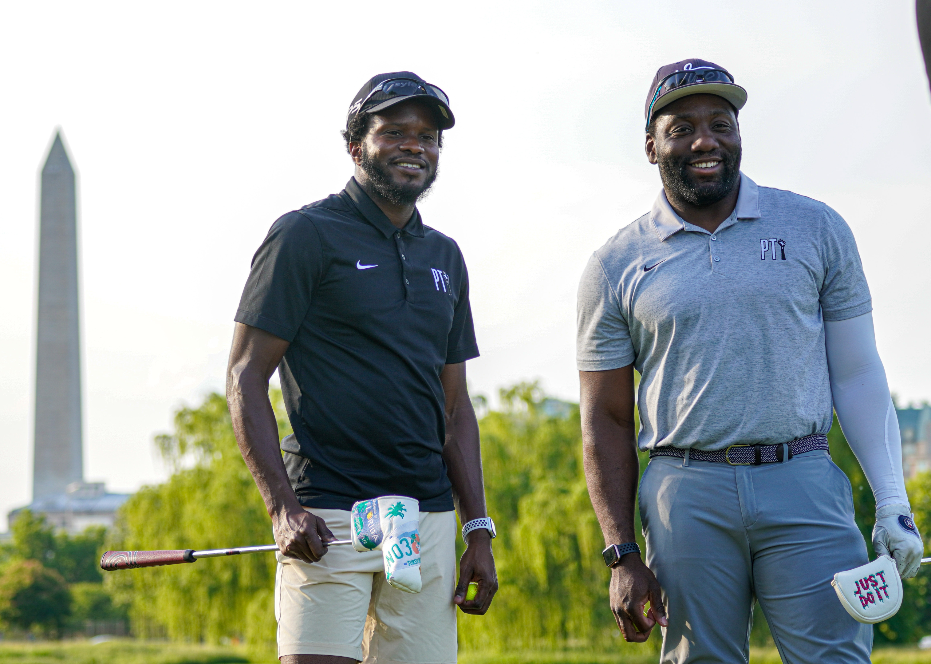 a golf instructor finishes a lesson with his student