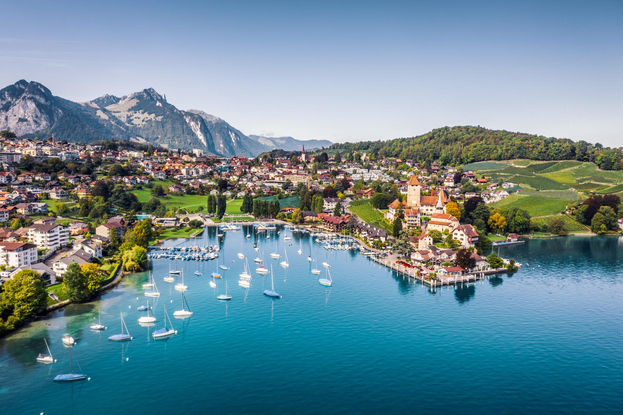 Moving to Switzerland from UK lakeside town marina lifestyle UK expats relocation scenic waterfront living Switzerland.