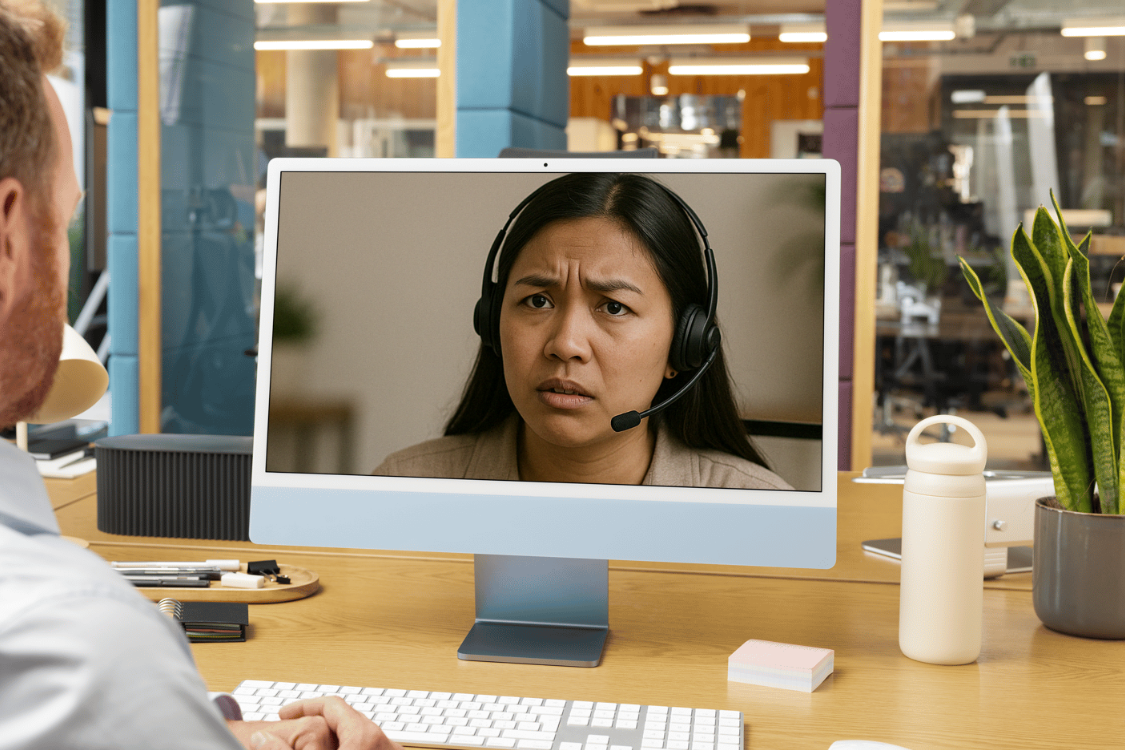 Female candidate looking uncertain during an online interview on a desktop screen