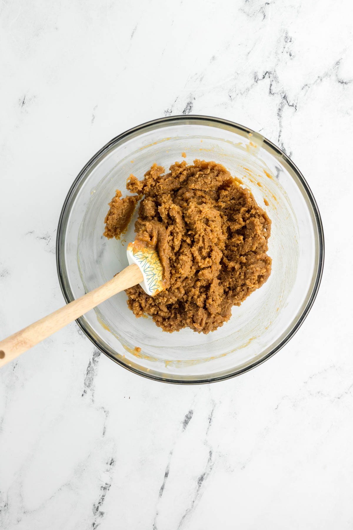 biscoff cookie butter dough in bowl with a spatula
