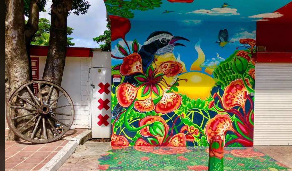 colorful mural showing a bird and flowers