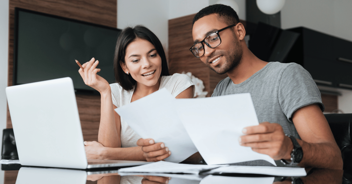 A couple reviewing their financial situation.