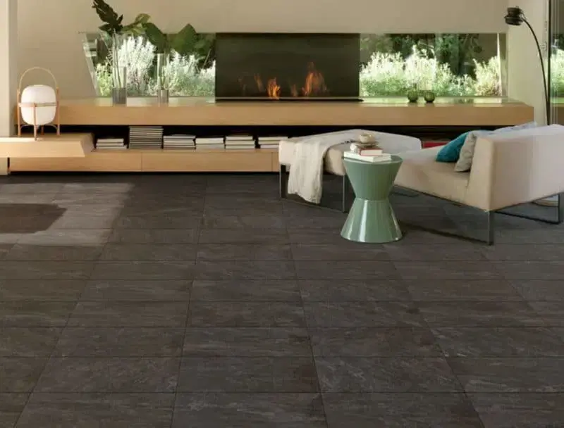 The Cosmos Grafite 60×30 floor and wall tiles by Saime bring a bold, charcoal finish that complements lawns and outdoor spaces.
