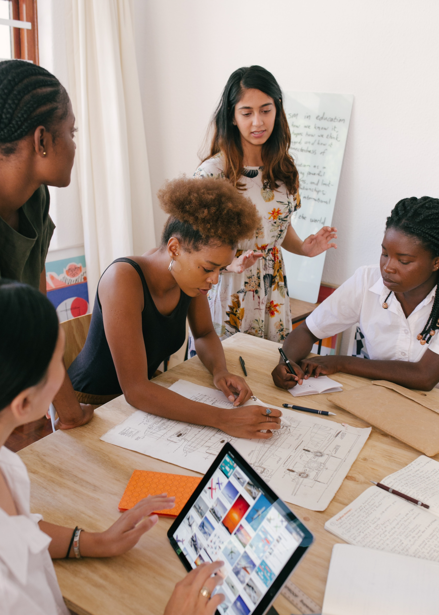 A person communicating clear expectations to a team