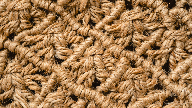 A close up view of a jute rug