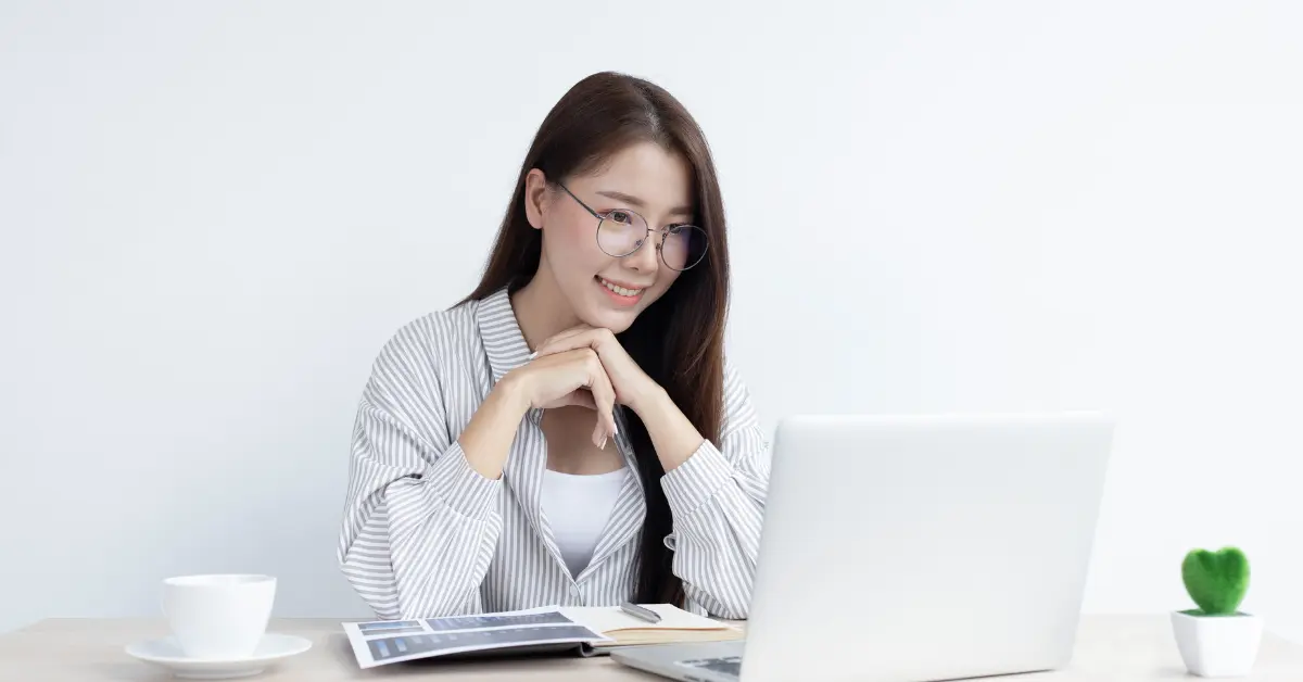 A woman studying the S Corp election form for her OnlyFans business.