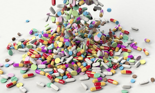 An image of a pile of pills, tablets, and capsules that may help swollen tonsils.