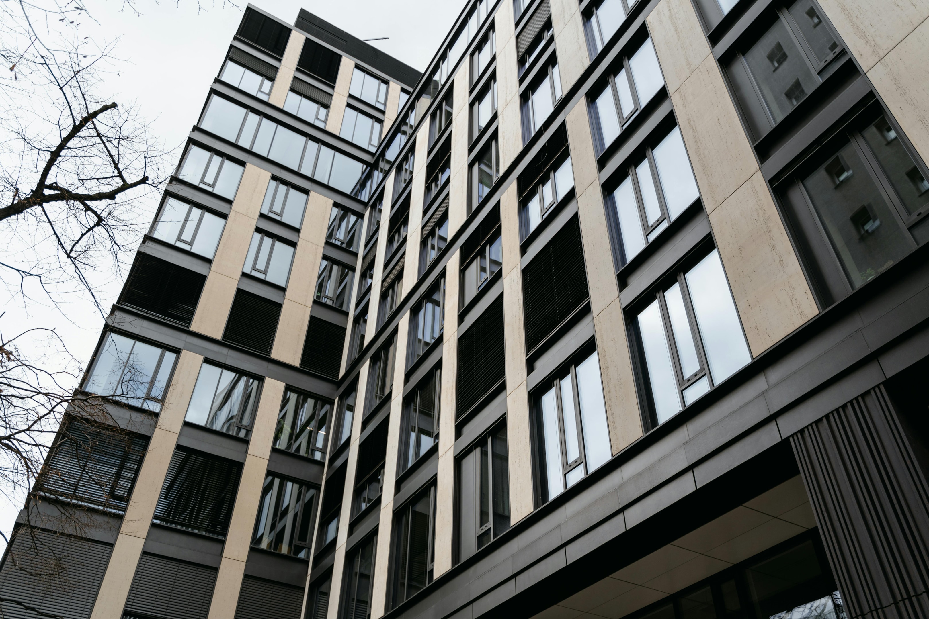 Exterior of an apartment complex, an example of residential real estate. 