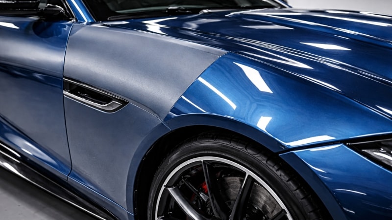 Jaguar is wrapped with glossy blue vinyl with proper finishing