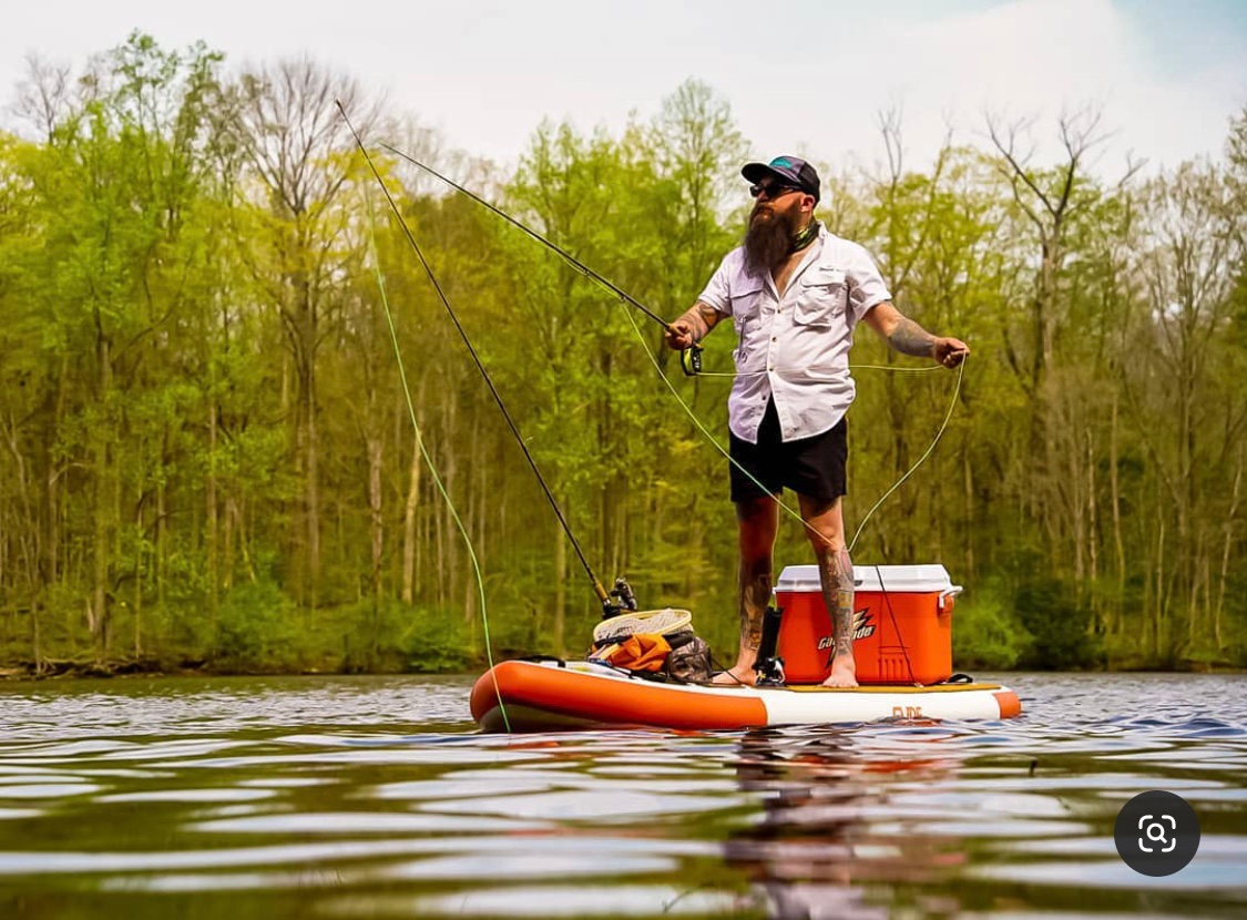personal floatation device on stand up paddle board 