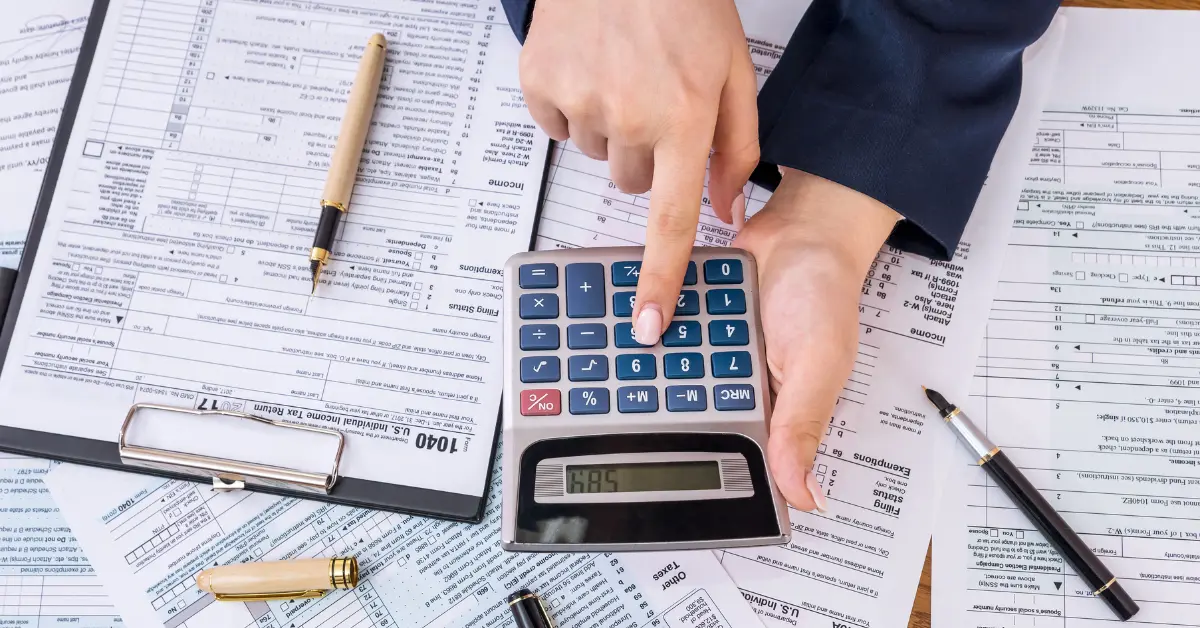 OnlyFans creator reviewing tax returns, considering standard deduction and charitable contributions for tax optimization.