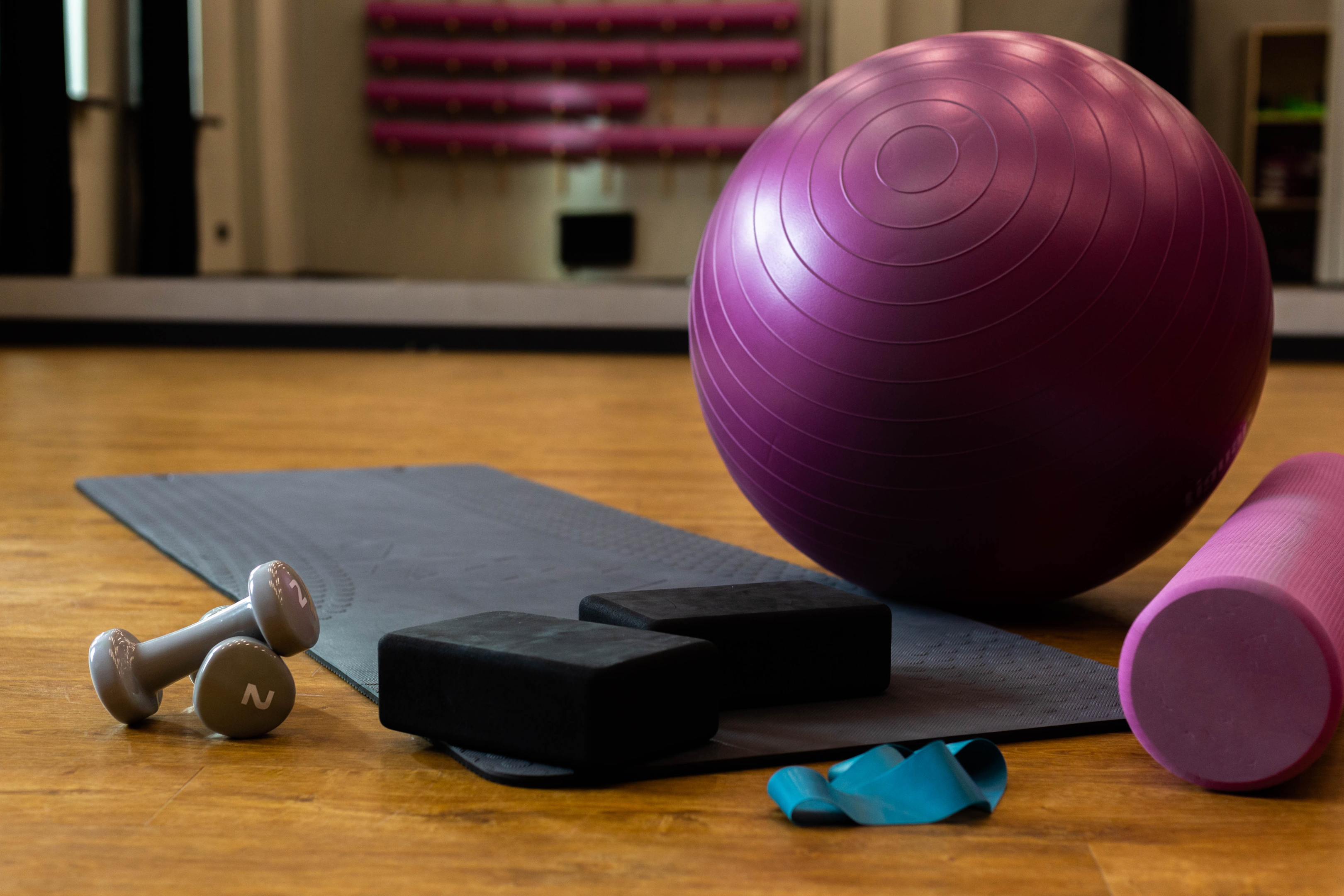 Image of weights, balls, bands or other exercise equipment that might be used for physical therapy sessions