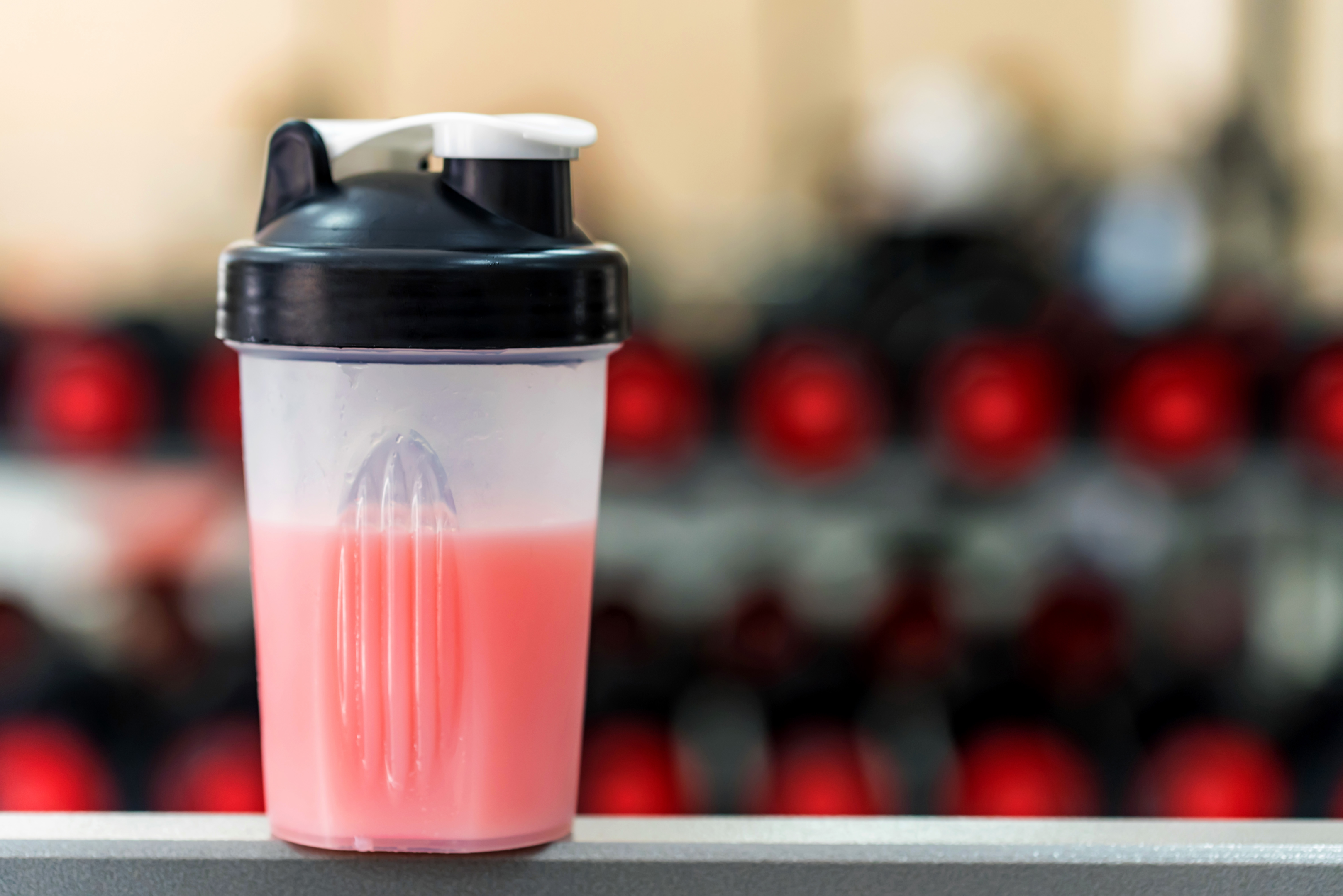 Picture of a shaker cup filled with a pump enhancer pre-workout supplement.